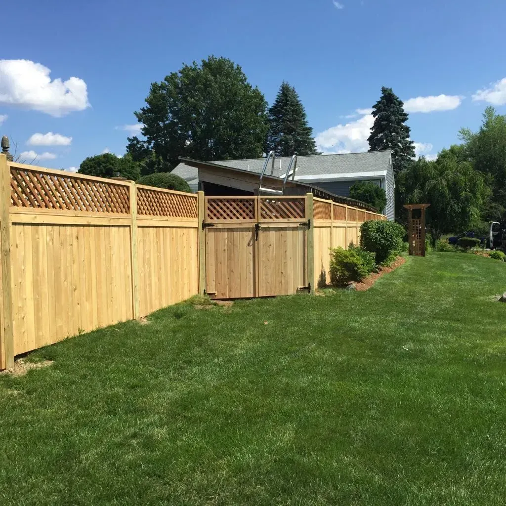 Cedar privacy fence with lattice top and gate